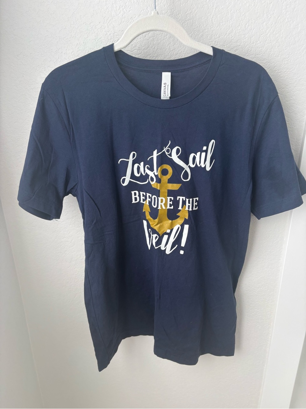 Bella Canvas Navy Short Sleeve Tee with Gold Anchor and White Script